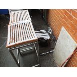 Two teak and chrome stools, a slab of marble,