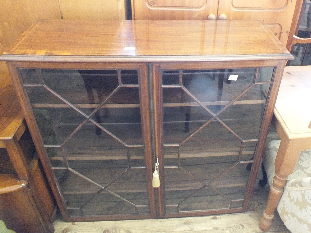 An Edwardian mahogany astral glazed bookcase