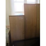 A large pine effect single door wardrobe (height 76") and a smaller pine effect single door