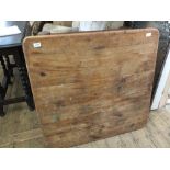 A pine plate rack plus a square pine coffee table (drawer missing) 35" x 35"