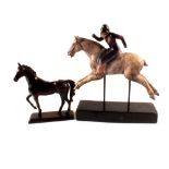 A horse and rider figure plus a stallion