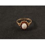 A 9ct gold opal and garnet cluster ring,