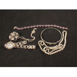 A lady's silver wristwatch together with a large silver flower pendant, silver amethyst set bangle,