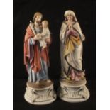 A pair of 19th Century bisque figurines, Joseph, Mary and Jesus,