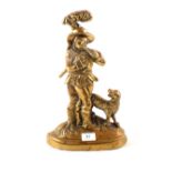 A Victorian brass man and dog doorstop