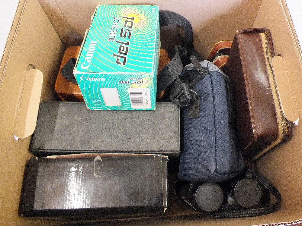 Four pairs of binoculars including Tasco, Minolta,