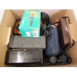 Four pairs of binoculars including Tasco, Minolta,