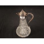A cut glass silver mounted claret jug