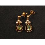 A pair of Edwardian style 9ct gold drop earrings set with green stone and seed pearls