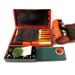 A pair of lawn bowls and carpet bowls plus backgammon sets