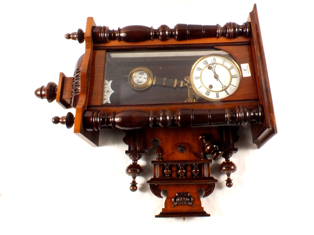 A mahogany cased regulator wall clock with enamel dial