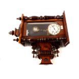 A mahogany cased regulator wall clock with enamel dial