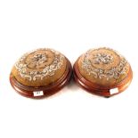 A pair of Victorian mahogany circular beadwork footstools