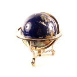 A terrestrial globe with semi-precious stone inlays