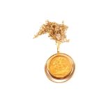 An 1897 half sovereign in 9ct gold mount of 9ct gold chain