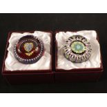 Two boxed Perthshire Millefiore and heart cone paperweights, both with P cane to underside,