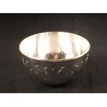 A silver bowl by Walker & Hall with applied decoration and engraved initials (bowl is dented),