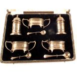 A cased silver five piece cruet set