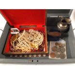 A quantity of costume jewellery in an inlaid box, a silver plated jug,