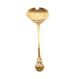 Victorian pierced brass cream skimmer with punched and serpent decoration