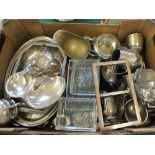 A large quantity of silver plated items including a twin handle tray and a condiment set in the