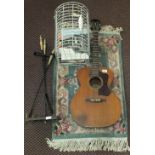 A bird cage and books, companion set, Chinese rug and a Guild guitar Inc,