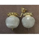 A pair of gilt metal and glass light fittings