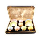 A cased Grosvenor china multi coloured tea set