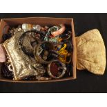 A large box of costume jewellery including necklaces, bracelets,