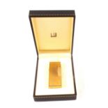 A Dunhill gold plated lighter in presentation box