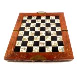 A Chinese carved wooden chess set and board