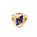 A 10ct gold fraternity ring with white and blue stone centre with a shield motif LA HS 1967,