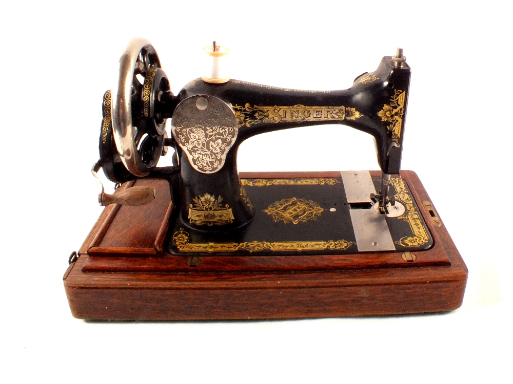 A Singer sewing machine, stylophone,