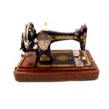 A Singer sewing machine, stylophone,