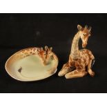 Two pieces of Franz Giraffe, a small side plate plus a sitting down giraffe,