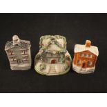 Two 19th Century Staffordshire cottage money boxes plus a pastille burner