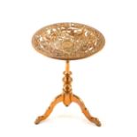 Victorian circular brass trivet in the form of a tripod table,