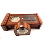 An oak cased 8 day mantel clock plus an oak cased wall hanging 8 day clock