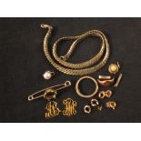 A small quantity of 9ct gold broken items including pieces of chain,