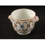 A floral porcelain cache-pot, cross swords mark,