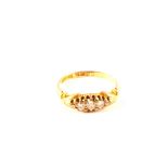 An 18ct gold graduated five stone diamond ring,