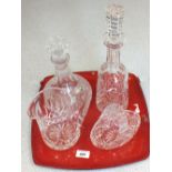 Two pieces of Waterford crystal cut glass to include a decanter and a pitcher plus two other cut