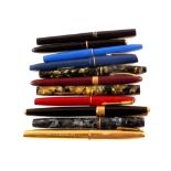 Eleven various fountain pens including Watermans and Wyvern mottle green examples