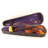 A Stradivarius copy violin and bow in case,