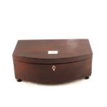 A large 19th Century double compartment bow front rosewood tea caddy on four bun feet,