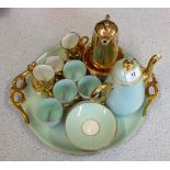 A continental blue and gilt porcelain part Cabaret set plus a gilt part coffee set