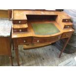 A Georgian revival lady's writing desk with four drawers,