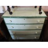 A vintage painted chest of four drawers