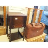 An oak sewing box on barley twist leg stand, pine hanging shelves,