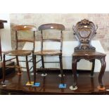 A carved hard seat hall chair on cabriole legs and two bedroom chairs